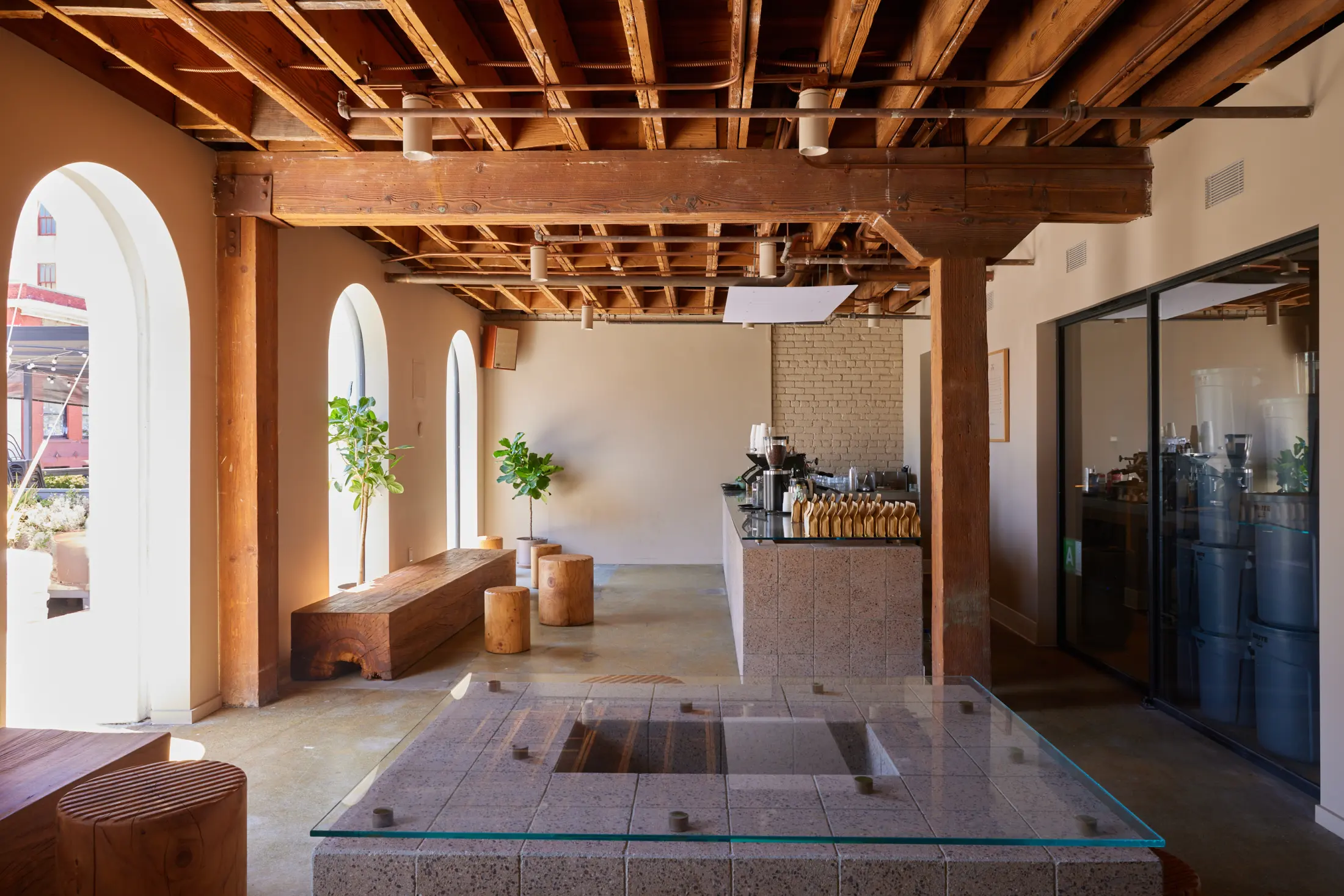 The counter and arched windows at Concierge Coffee at Signal
