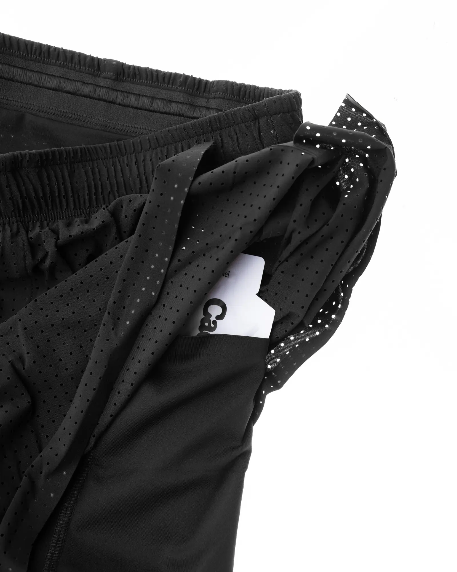 Black running shorts with a mesh pocket, Currently Running