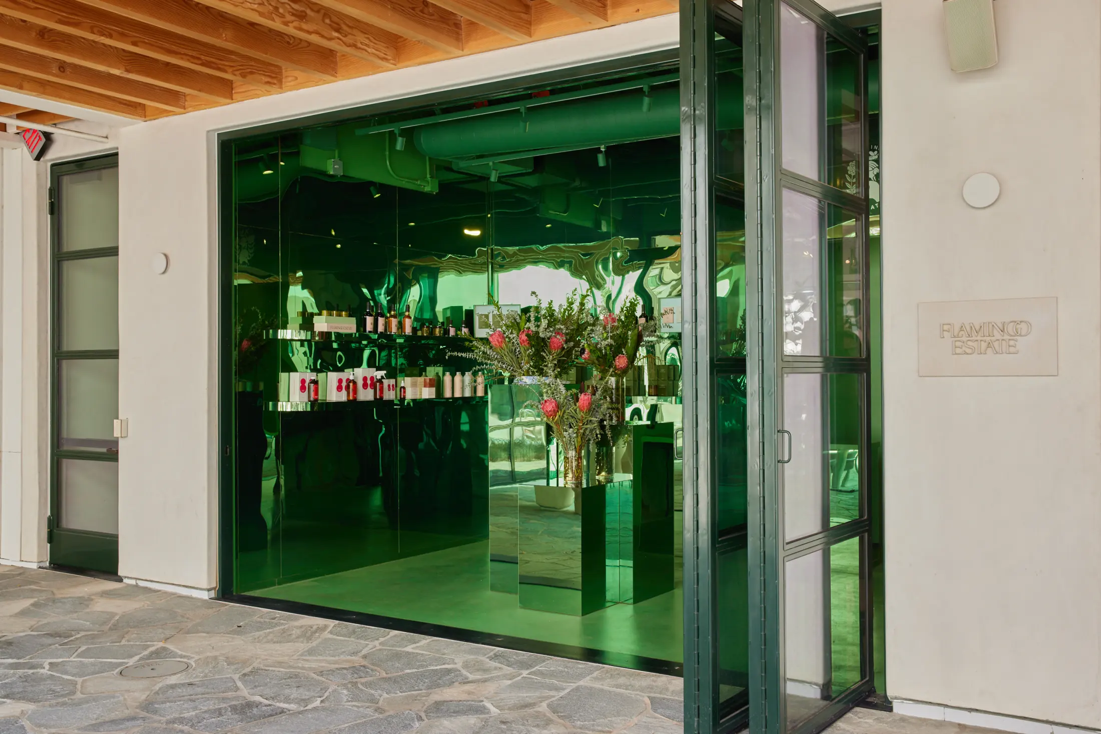 The Flamingo Estate storefront on the courtyard at Signal