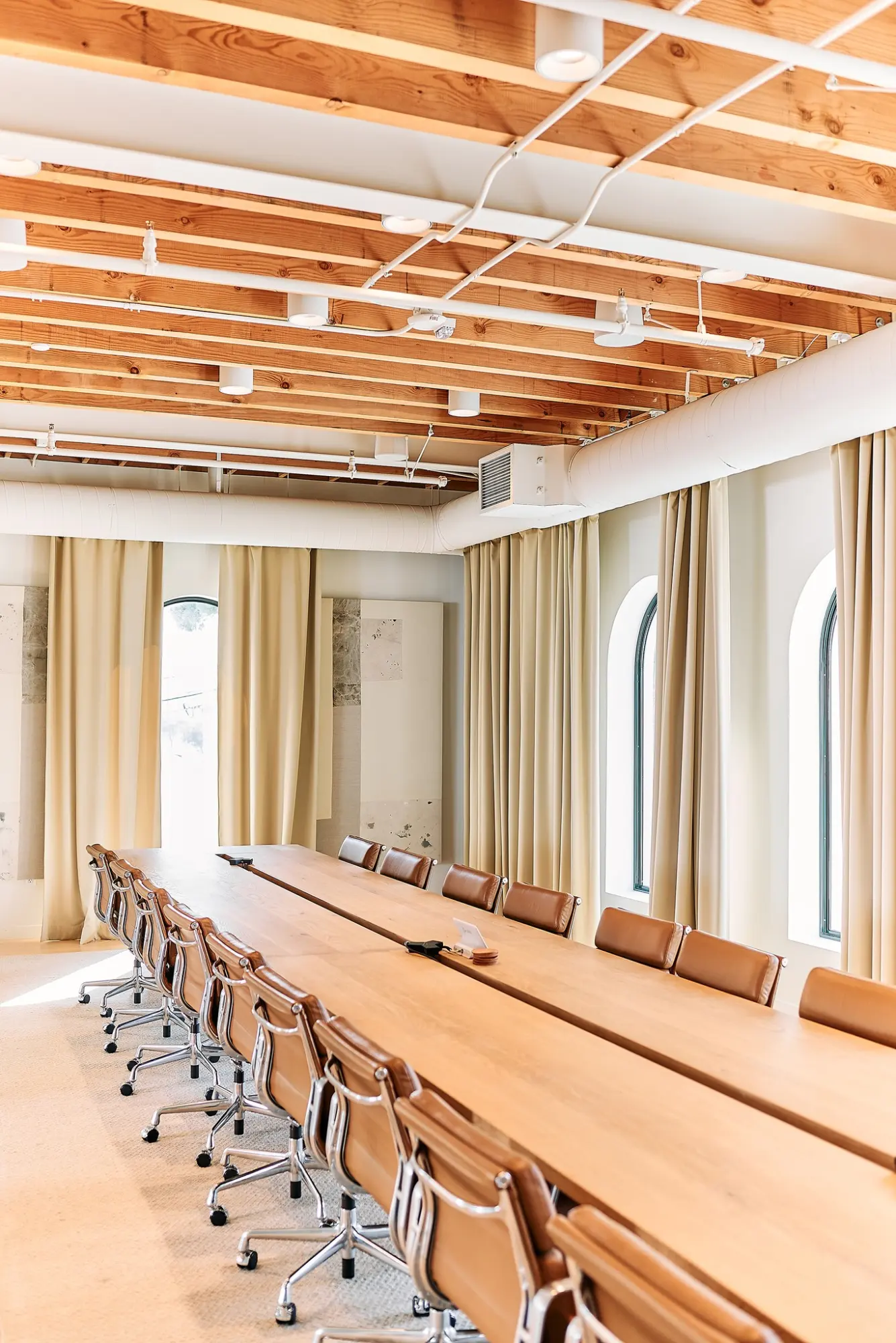 A long boardroom table in the Greycroft office at Signal