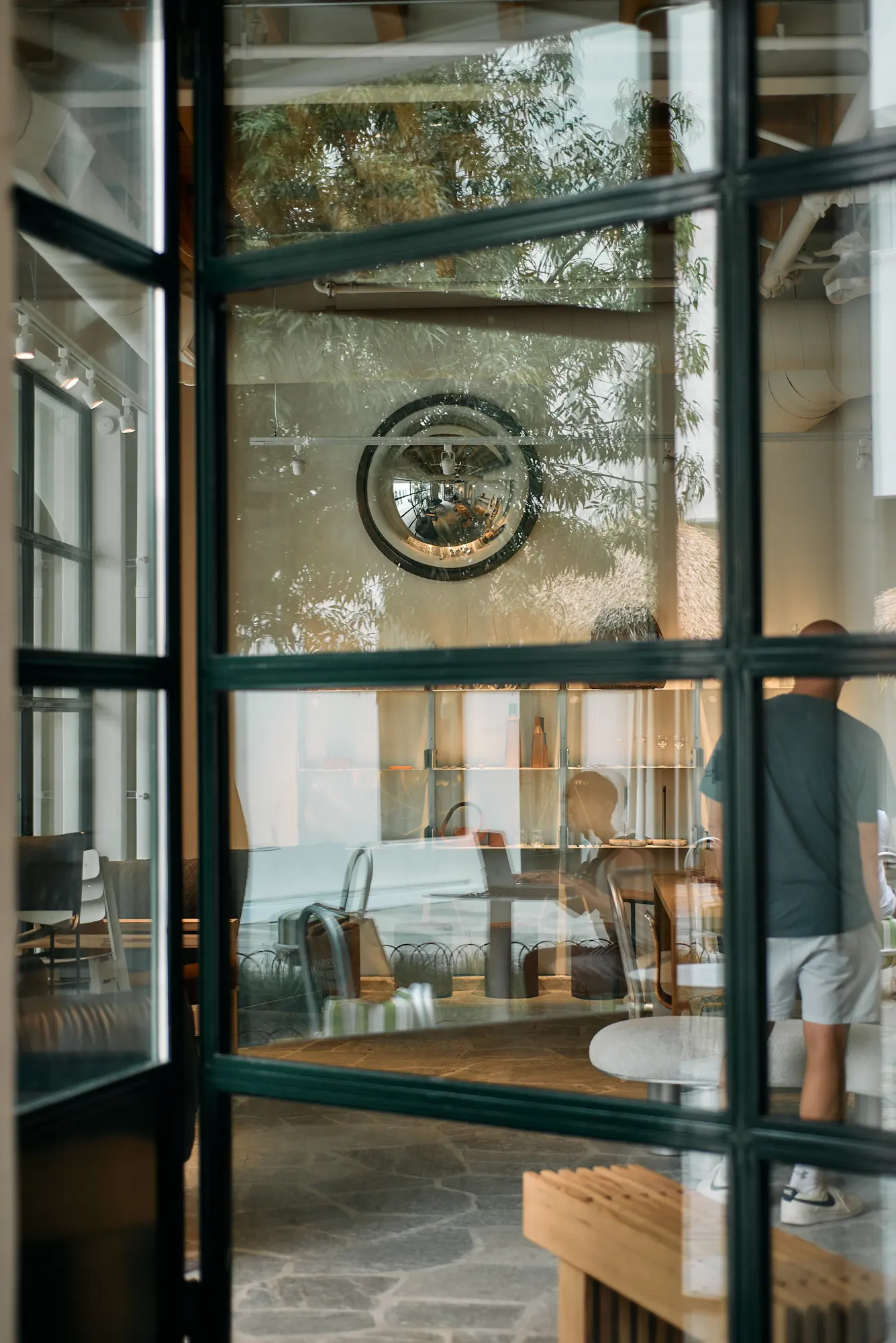 The steel and glass door of the Klein home store at Signal