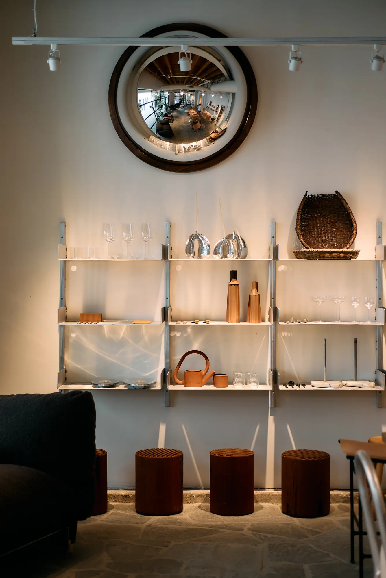 Shelves and wooden stools in the Klein home store at Signal
