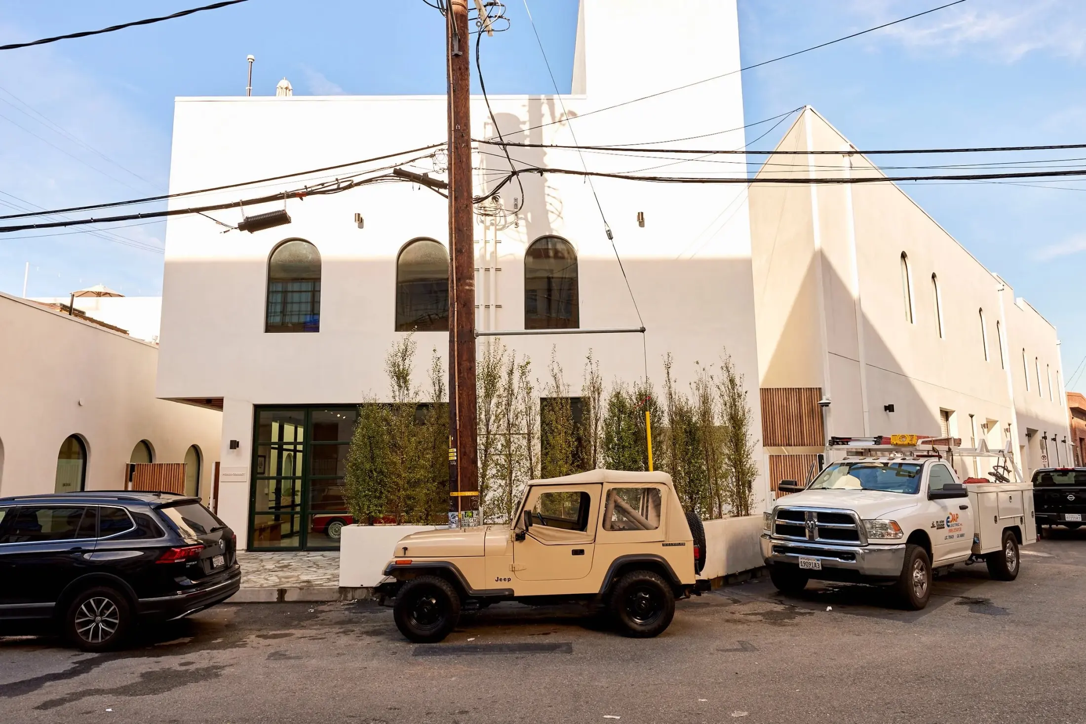 Signal from the street with a vintage Jeep parked in front
